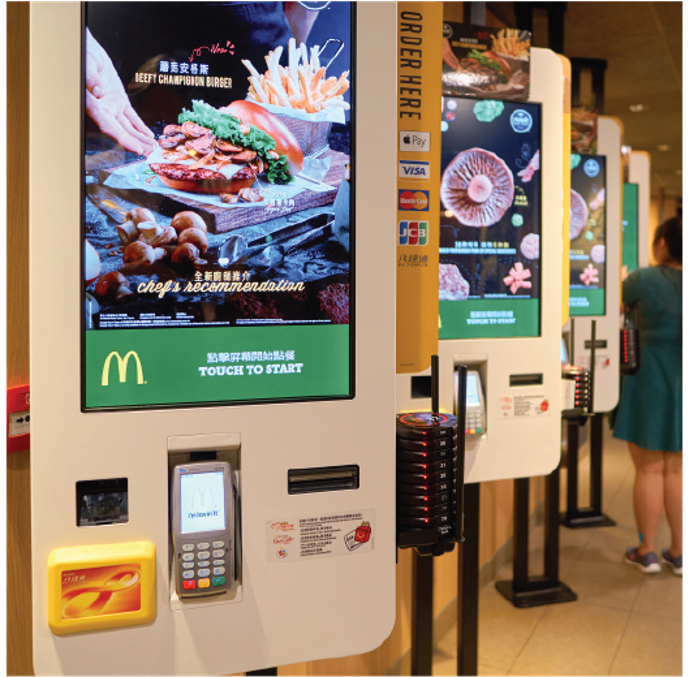 Self service screens at a fast food restaurant