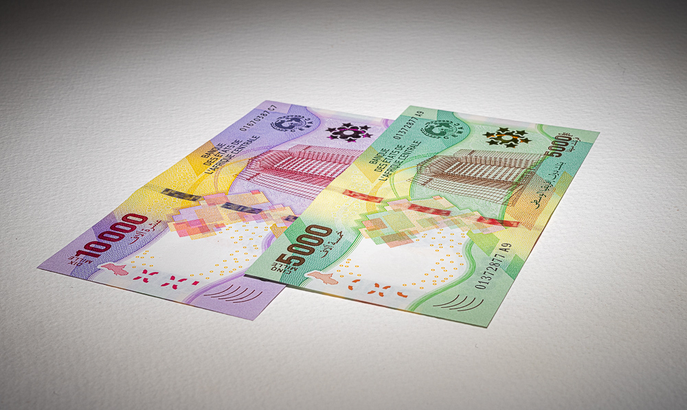 The two new notes laid out