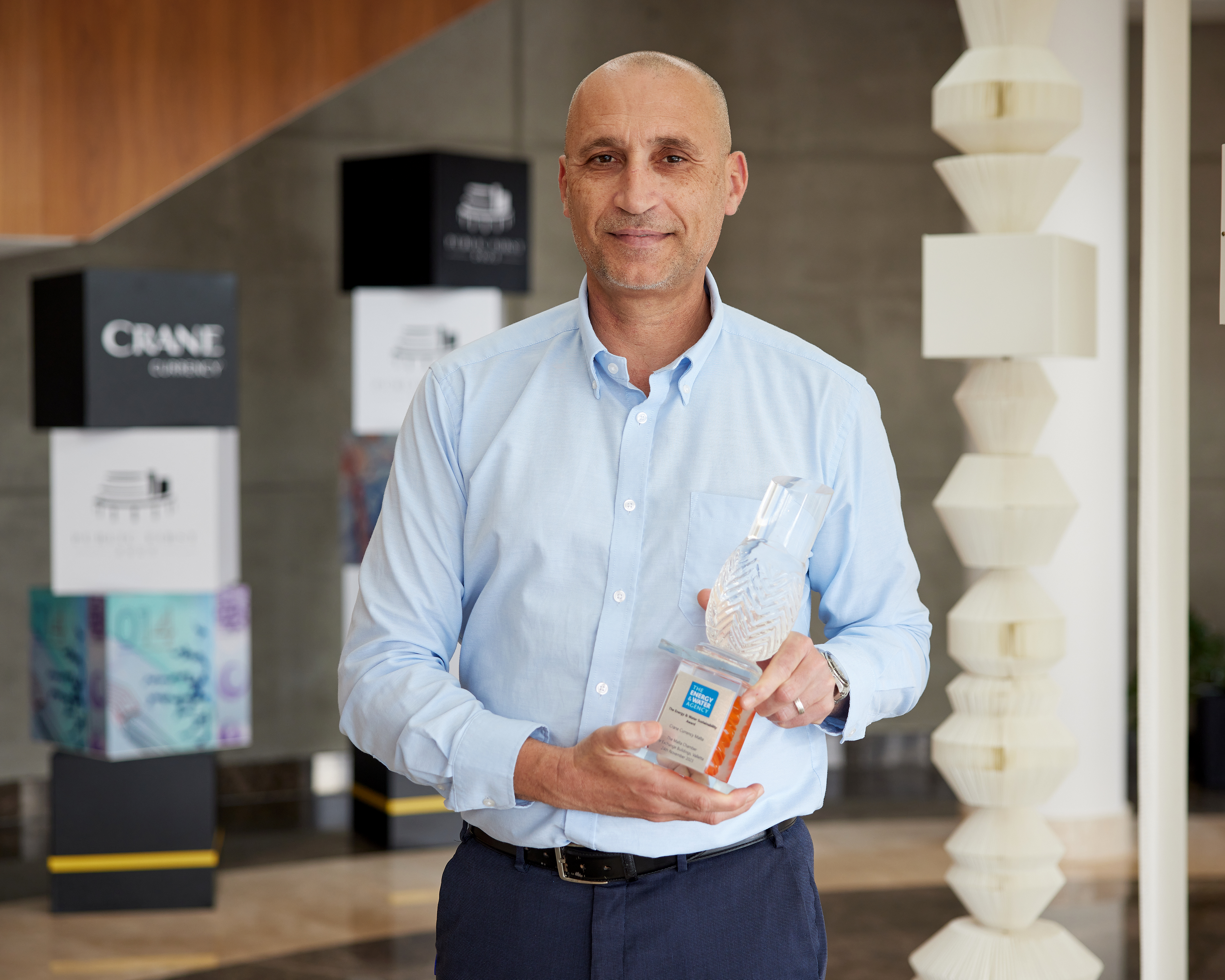 Paul Fenech holding the MEEA award