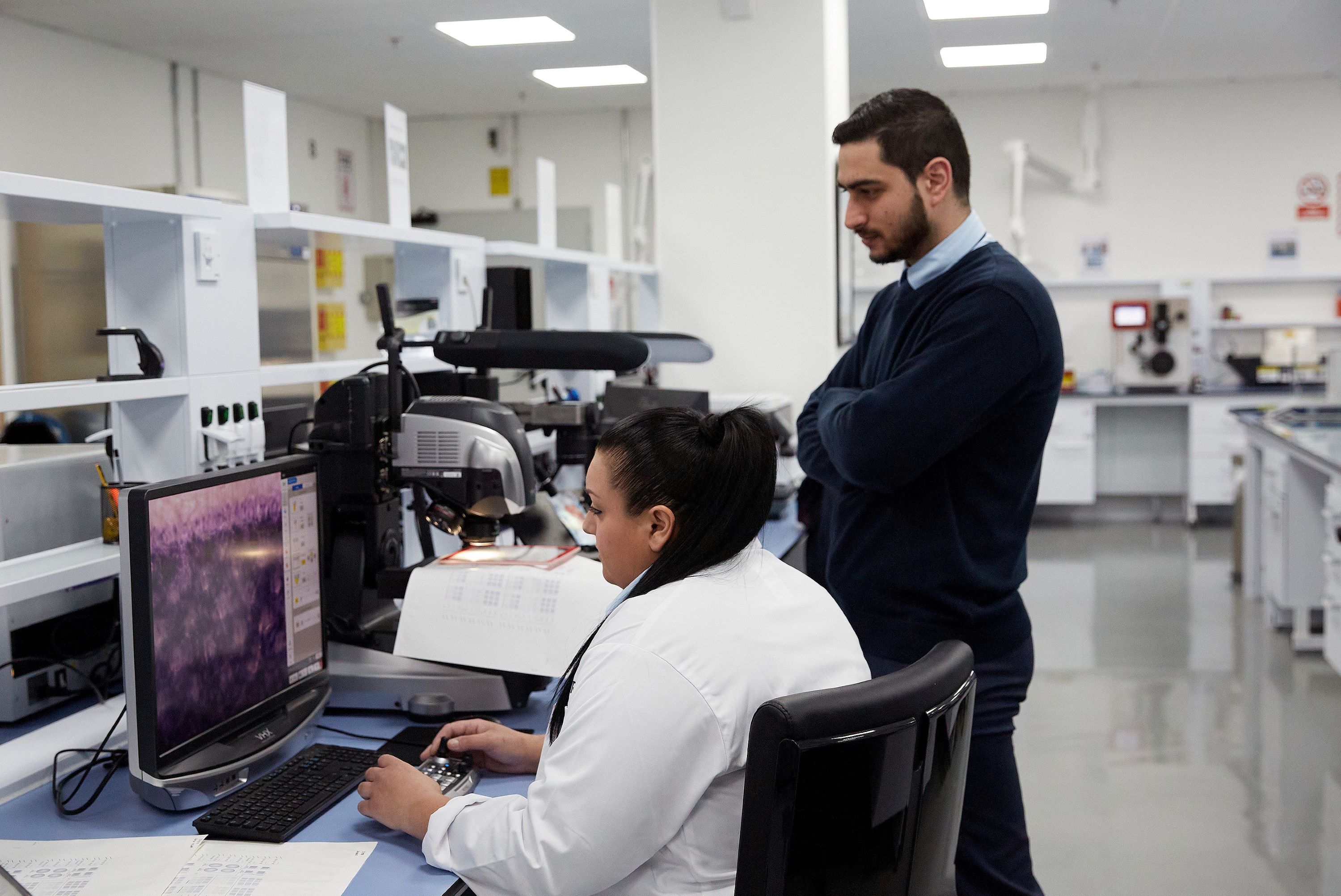 A picture of the interior of the Malta laboratory with two of Crane's quality testers